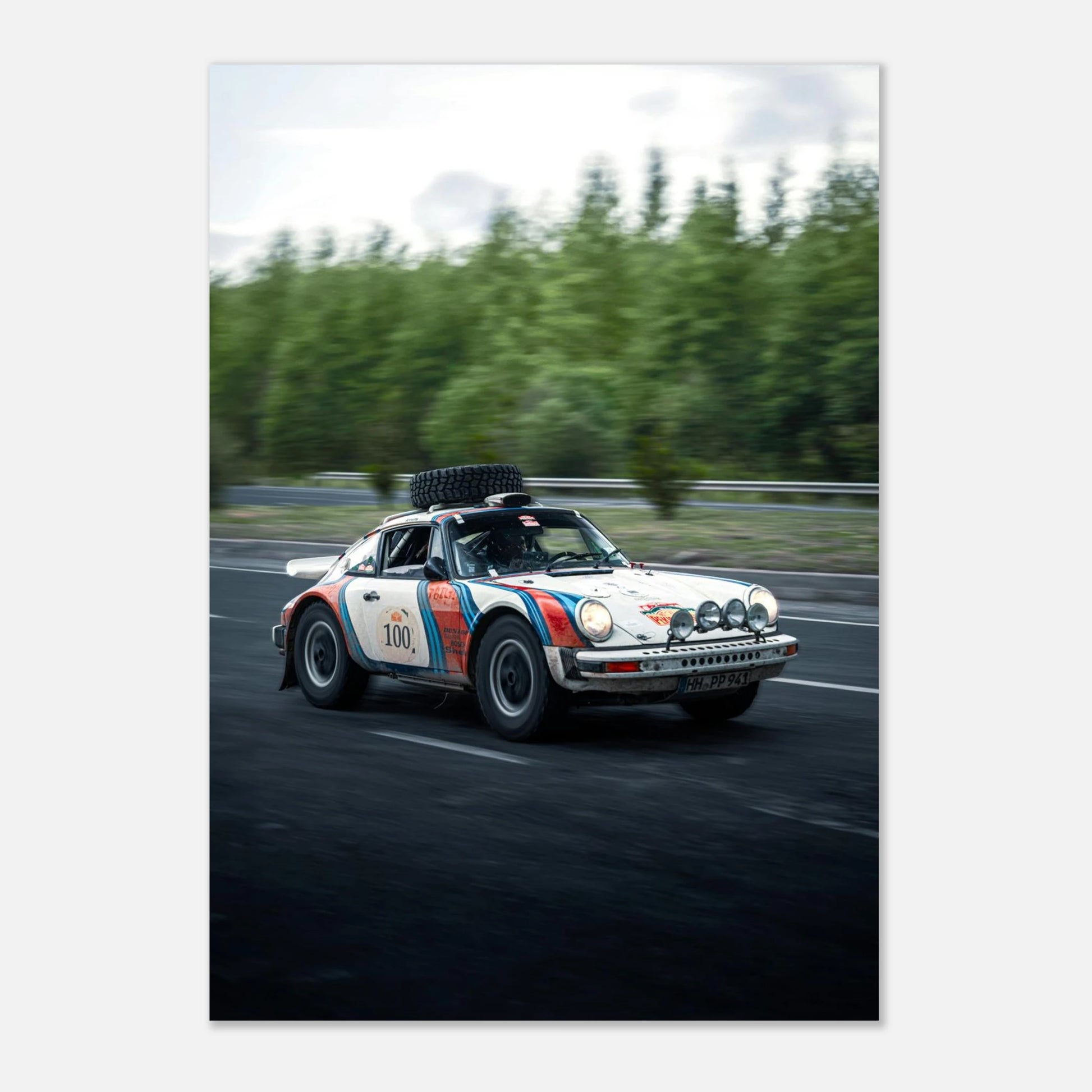 Porsche 911 Dakar premium poster on a track with trees in the background
